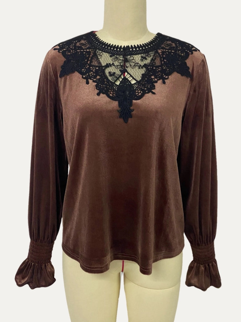 Coffee Brown Velvet Blouse , features a crochet lace pattern, rounded neckline, and long sleeves and a relaxed bodice that features a button at the back and a keyhole .