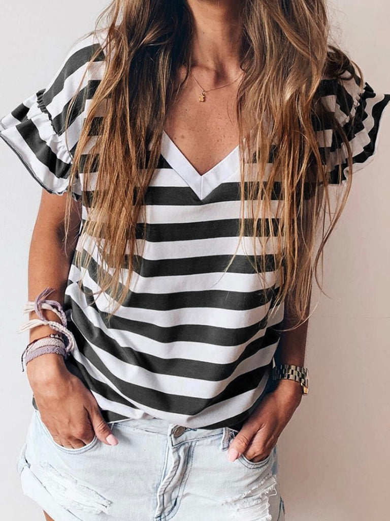 Reversible Stripe Top classic black and white stripes With a reversible v neckline and cute ruffle sleeves.