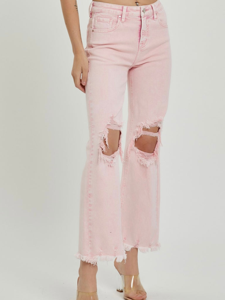 Acid Pink Jeans. Cropped length, distressed knees and frayed hemline.