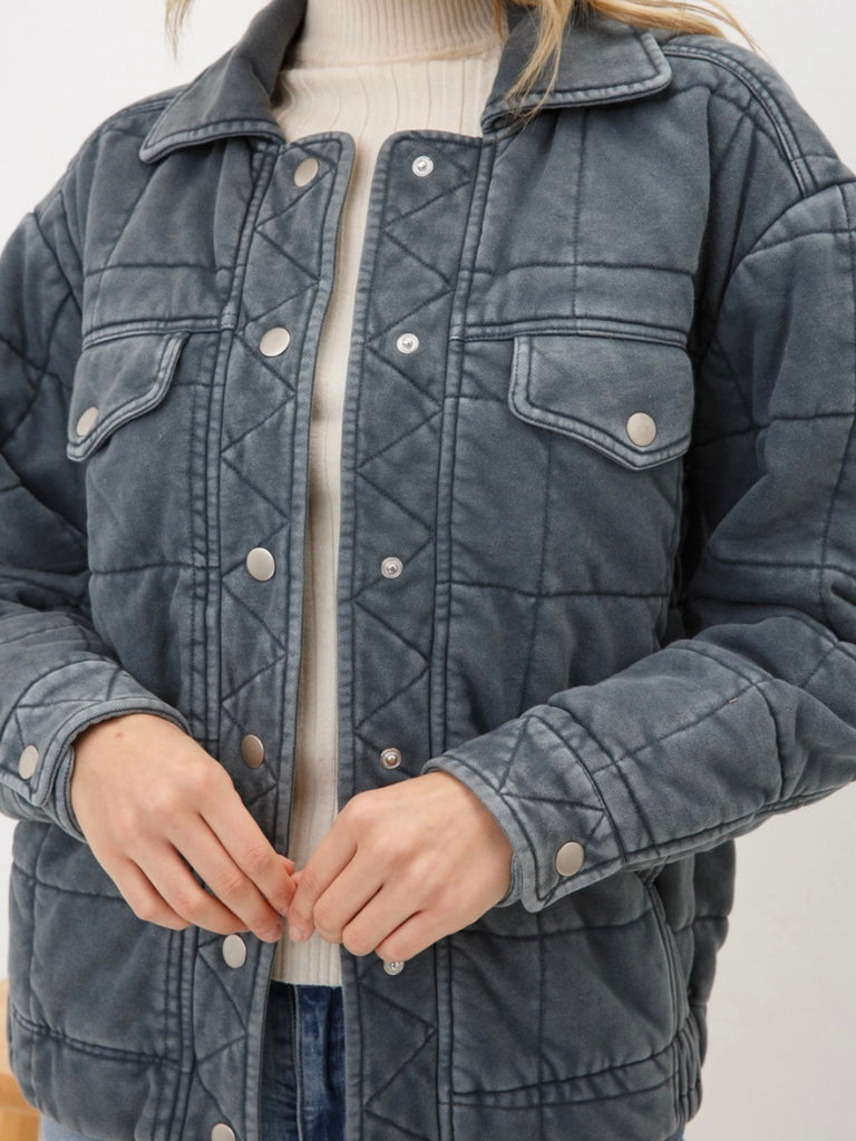 Grey Stone Washed Quilted Jacket! With a playful oversized fit and snap close.