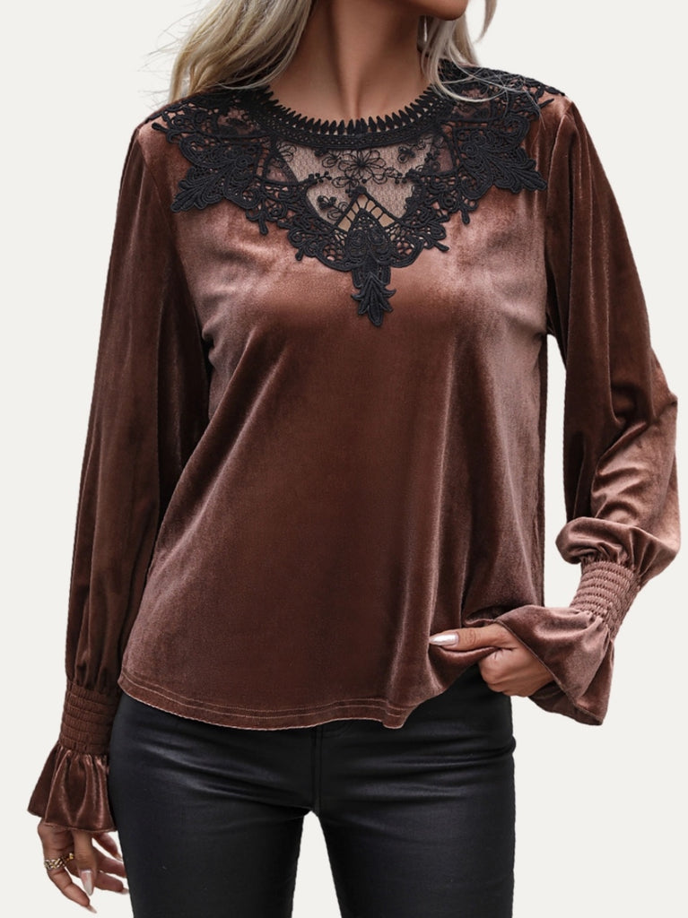 Coffee Brown Velvet Blouse , features a crochet lace pattern, rounded neckline, and long sleeves and a relaxed bodice that features a button at the back and a keyhole .