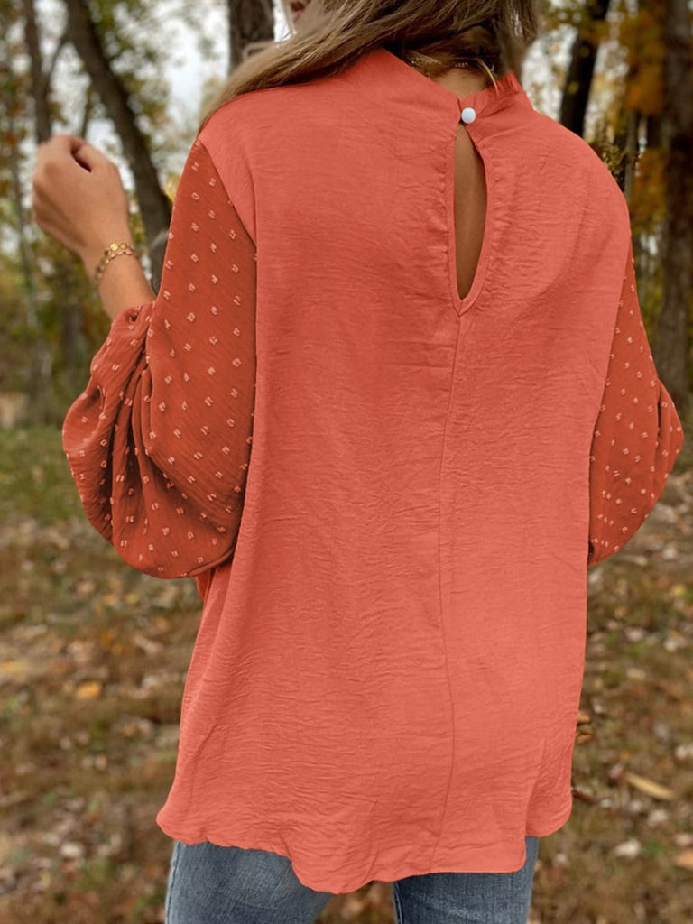 Orange , Balloon Sleeve Top, with a Contrasting Swiss Dot Pattern, and Elegant Keyhole Detailing.