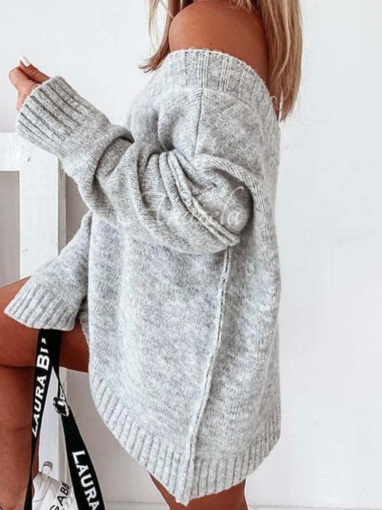 Grey oversized sweater features a stylish V-neck and dropped shoulder , it also has wide ribbed trim and exposed seams.