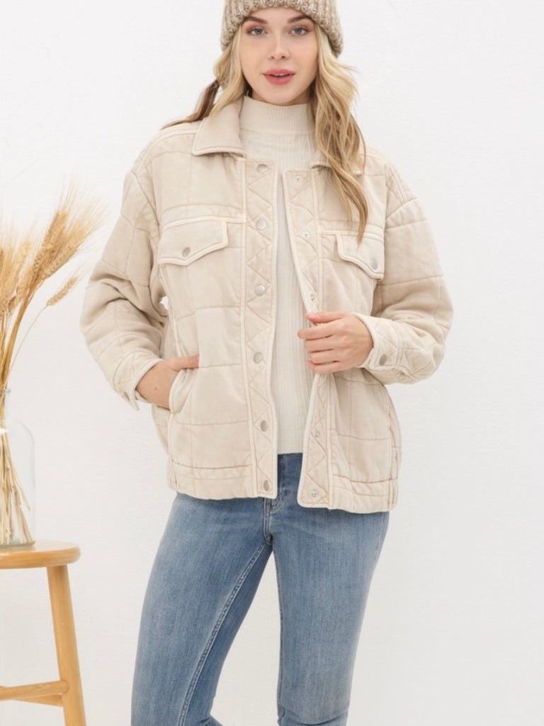 Taupe Stone Washed Quilted Jacket! With a playful oversized fit and snap close.