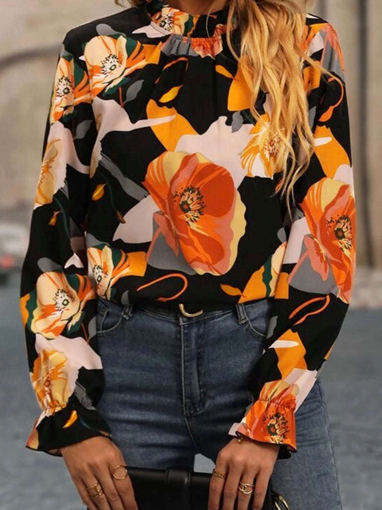 Bold Floral Blouse with Mock neck frill detailing,Ruffled long sleeves and Keyhole back closure.