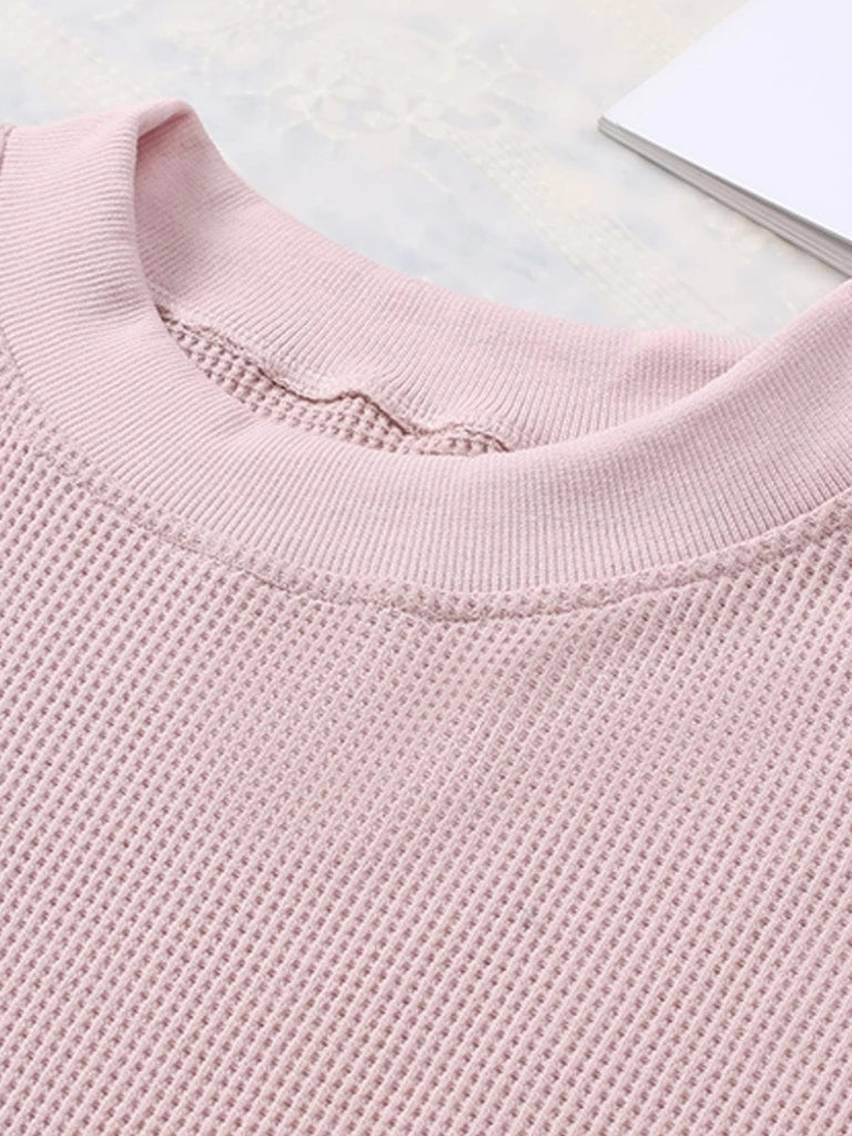 Pink Berlin Waffle Knit Long Sleeve Top. Made with ultra-soft and stretchy fabric.