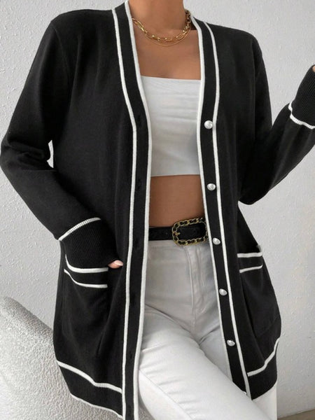 Button Front Varsity Cardigan in black with white trim and a longer fit, and front pockets.