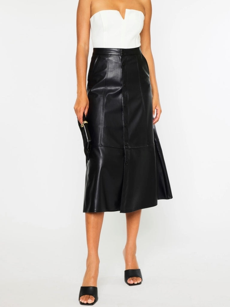 Black Faux -Leather Skirt features a high waistline, Exposed Snap Button Closure, the length of the skirt falls to the floor.