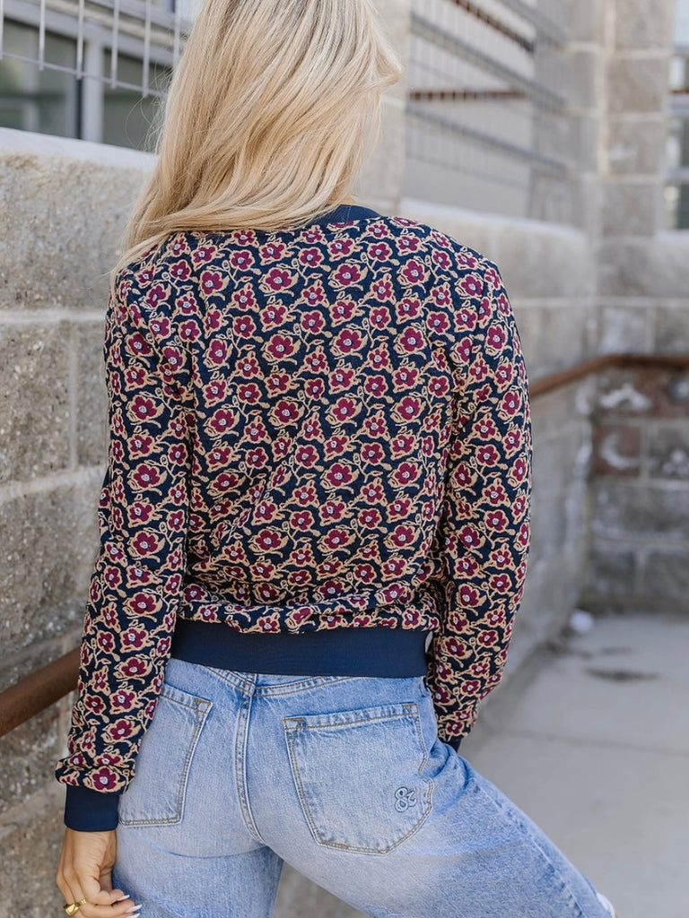 Flower Bomber Jacket with purple Flowers and Navy Background.