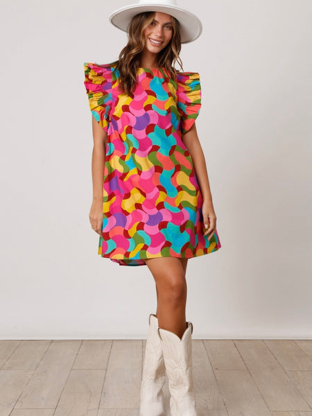 Shift Dress, featuring a vibrant geometric print ,made from soft and breathable 100% cotton, this dress also boasts smocked short ruffle sleeves.