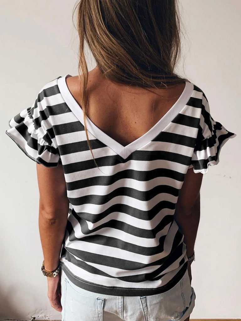 Reversible Stripe Top classic black and white stripes With a reversible v neckline and cute ruffle sleeves.