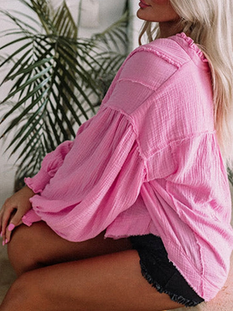 Pink long sleeve Crinkle Top, Unique grilled seam detailing and trendy puff sleeves with 3 button detail.