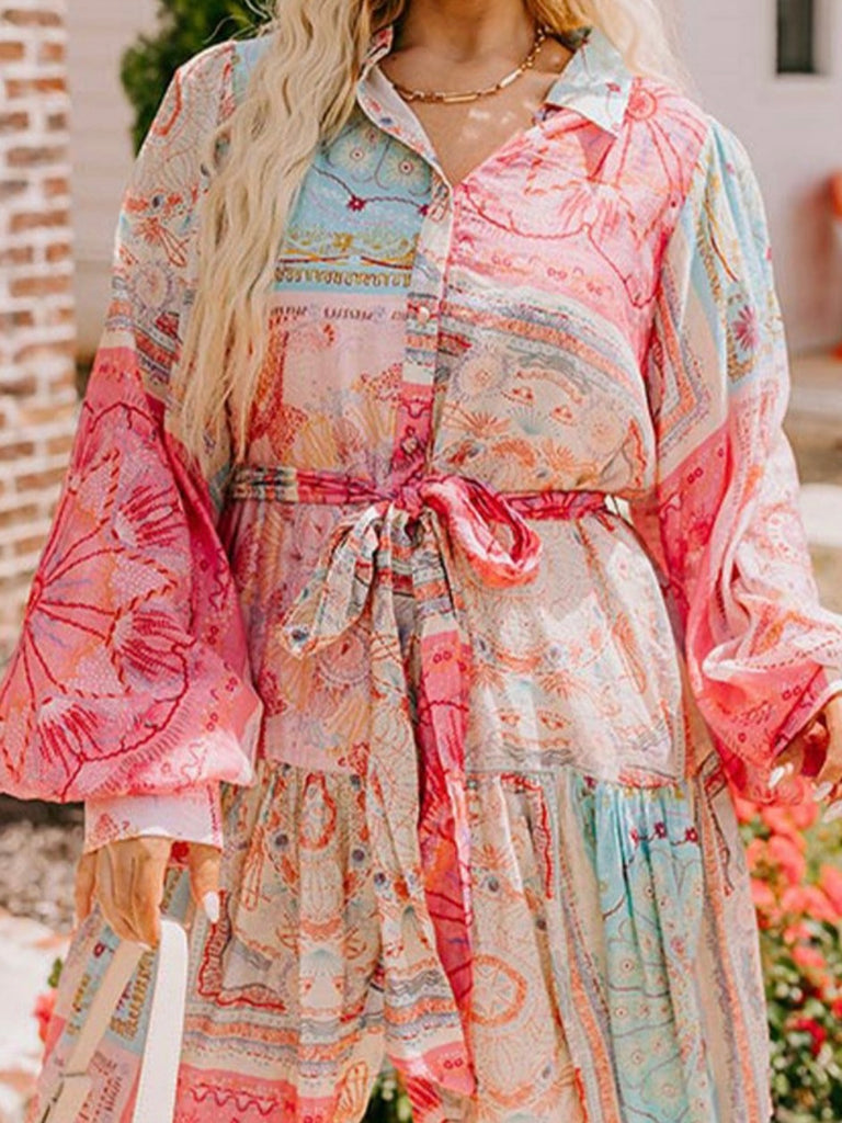 Boho Patches Dress with Bubble Sleeves, Belted Waistline: The belted design cinches your waist, creating a flattering silhouette.
 The colorful blend of patch-style patterns gives the dress a playful yet sophisticated look.