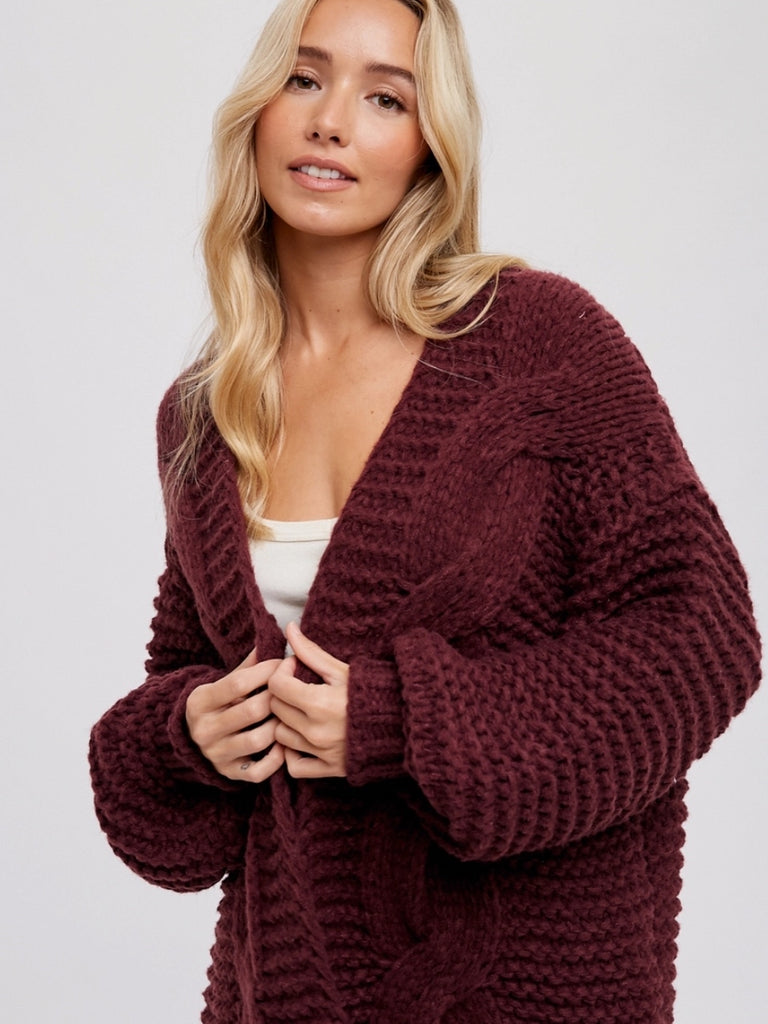 Wine Colour Chunky Cable Cardigan with long batwing sleeves and unique braid pattern, it's an oversize fit.