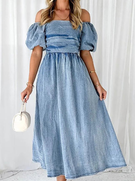 Deirdre Denim Dress with a Flirty off the shoulder detail and puffy sleeves for a beautiful fit.