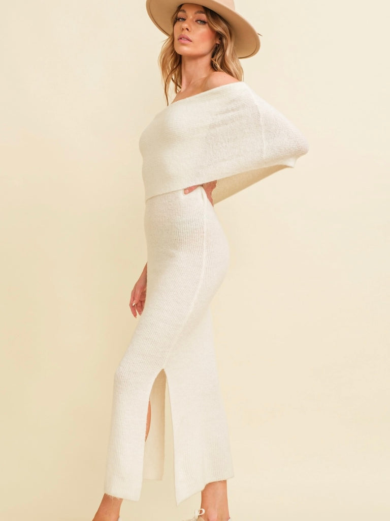 Ivory Creme off-shoulder Midi dress, is made with a 50/50 blend of acrylic and polyamide.