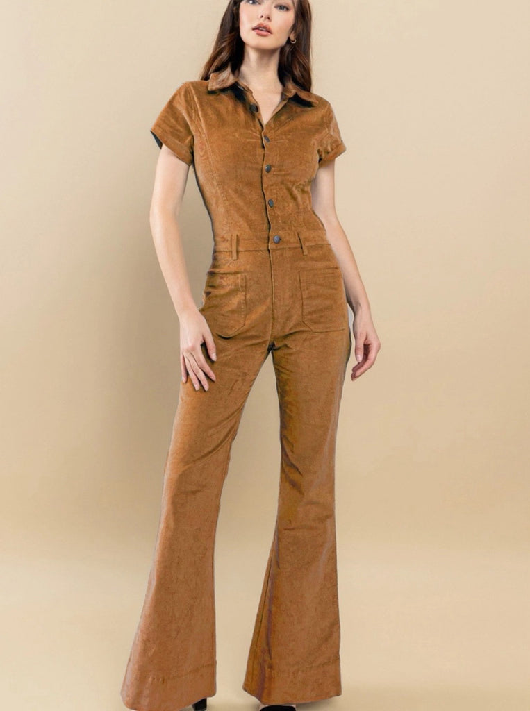 Tan Corduroy Jumpsuit ,button front, and a zipper, with pockets, and a flare leg.