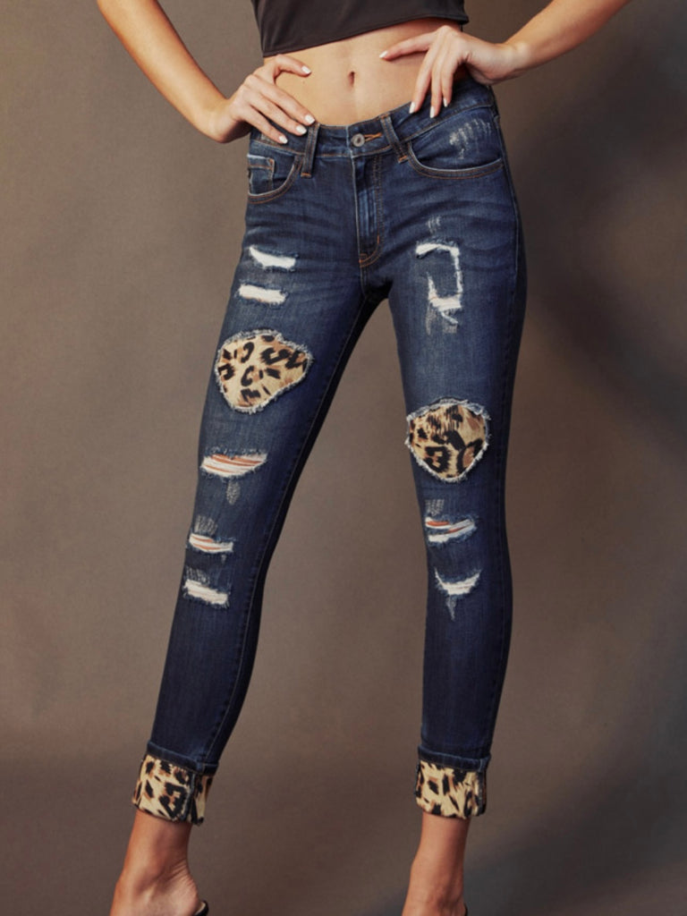 Faded patchwork denim skinny jeans with Leopard print by Kancan .