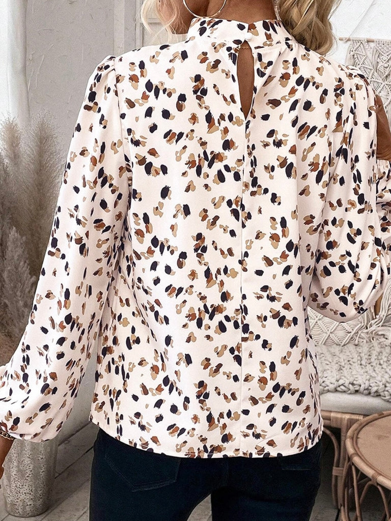 Leopard  Print Lantern Sleeve Blouse  features a chic mock neck design, and flattering pleated neckline.