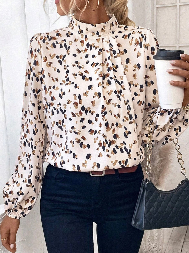 Leopard  Print Lantern Sleeve Blouse  features a chic mock neck design, and flattering pleated neckline.