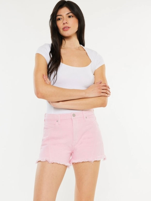 3" Inseam Pink Kancan shorts with high rise and hidden waistband and a frayed hem.