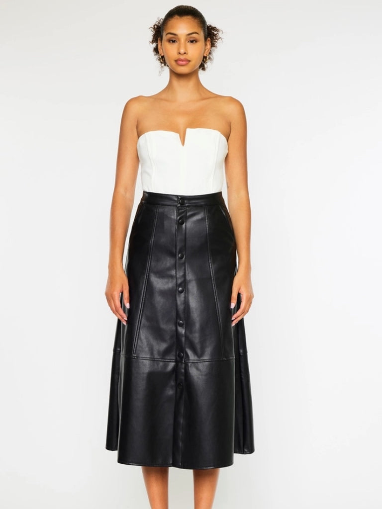 Black Faux -Leather Skirt features a high waistline, Exposed Snap Button Closure, the length of the skirt falls to the floor.