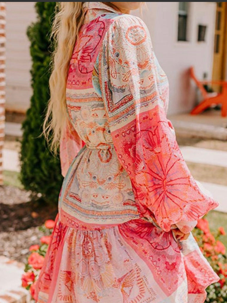 Boho Patches Dress with Bubble Sleeves, Belted Waistline: The belted design cinches your waist, creating a flattering silhouette.
 The colorful blend of patch-style patterns gives the dress a playful yet sophisticated look.