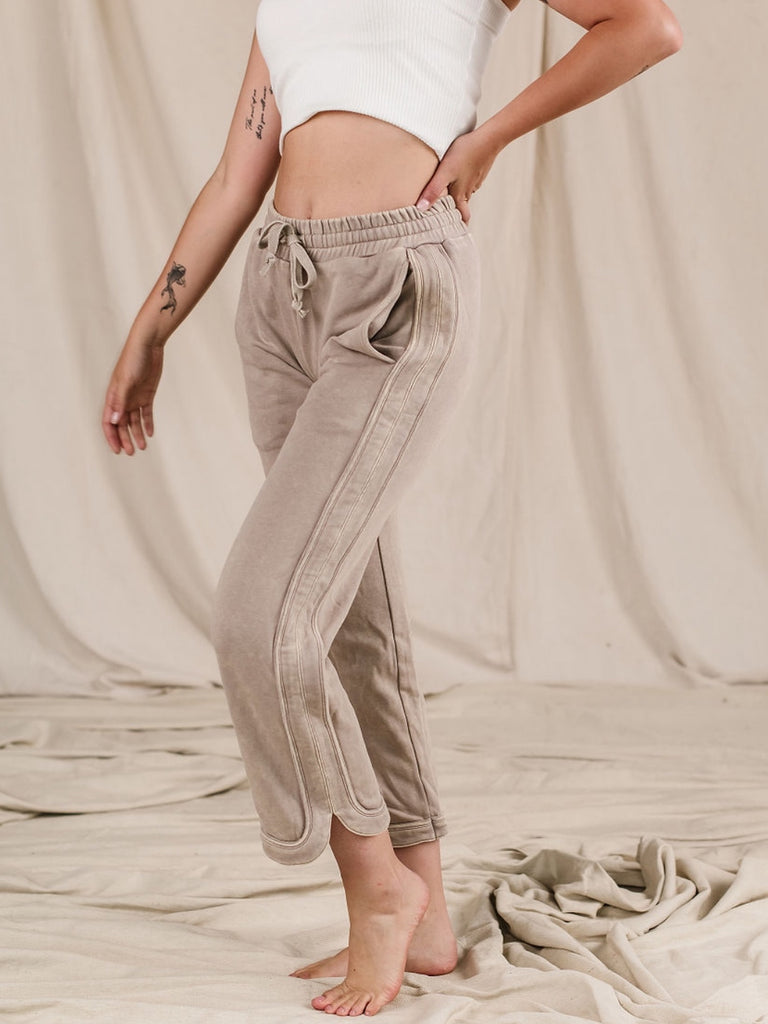 Medium Stretch Stone -Grey elastic-waisted, straight-legged pant with two side pocket and hem slits, and tie waist.