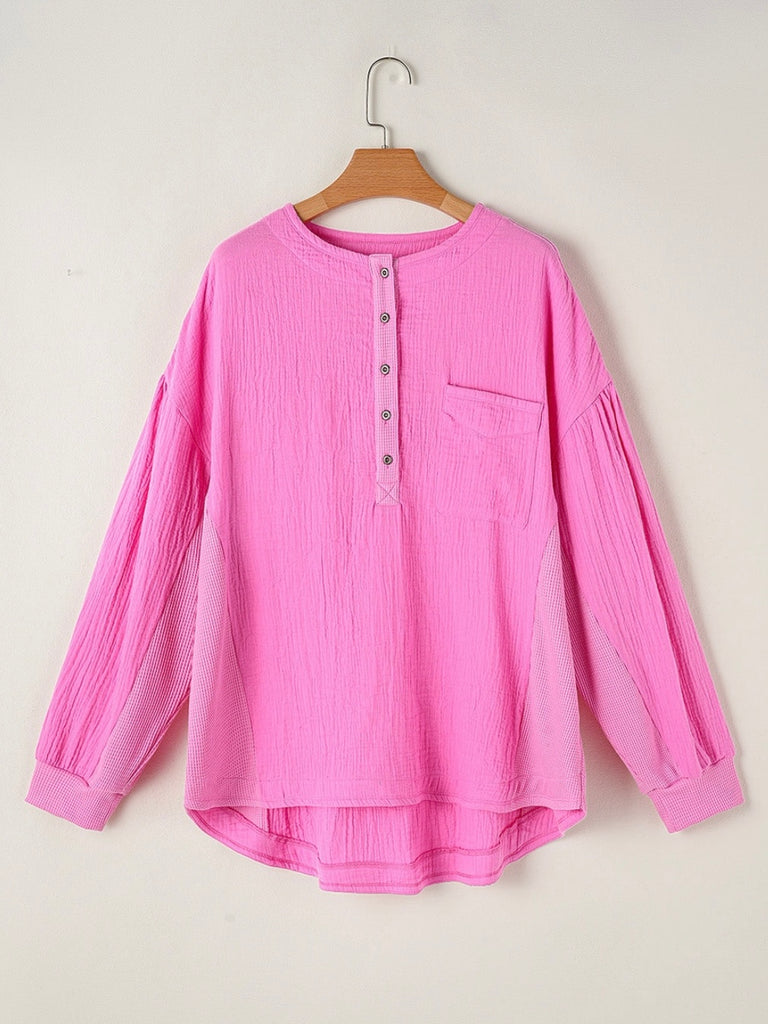 Curvy fit, pink colour, plus-size top with practical chest pockets, and relaxed drop sleeves for an oversized, comfortable fit.