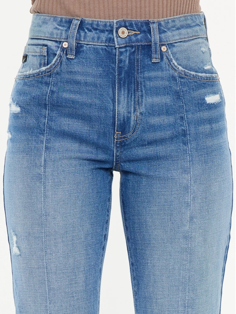 High Rise Flare Jeans with wide leg pleats detail and 5 pocket style, single-button closure, and zip fly.