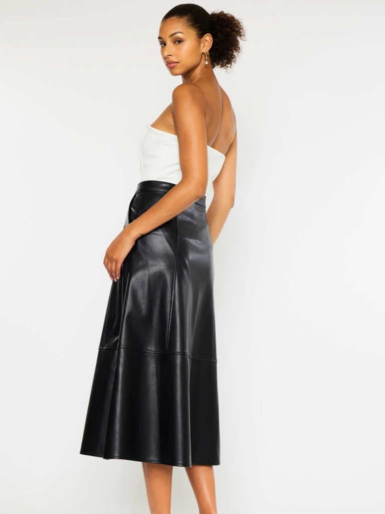 Black Faux -Leather Skirt features a high waistline, Exposed Snap Button Closure, the length of the skirt falls to the floor.