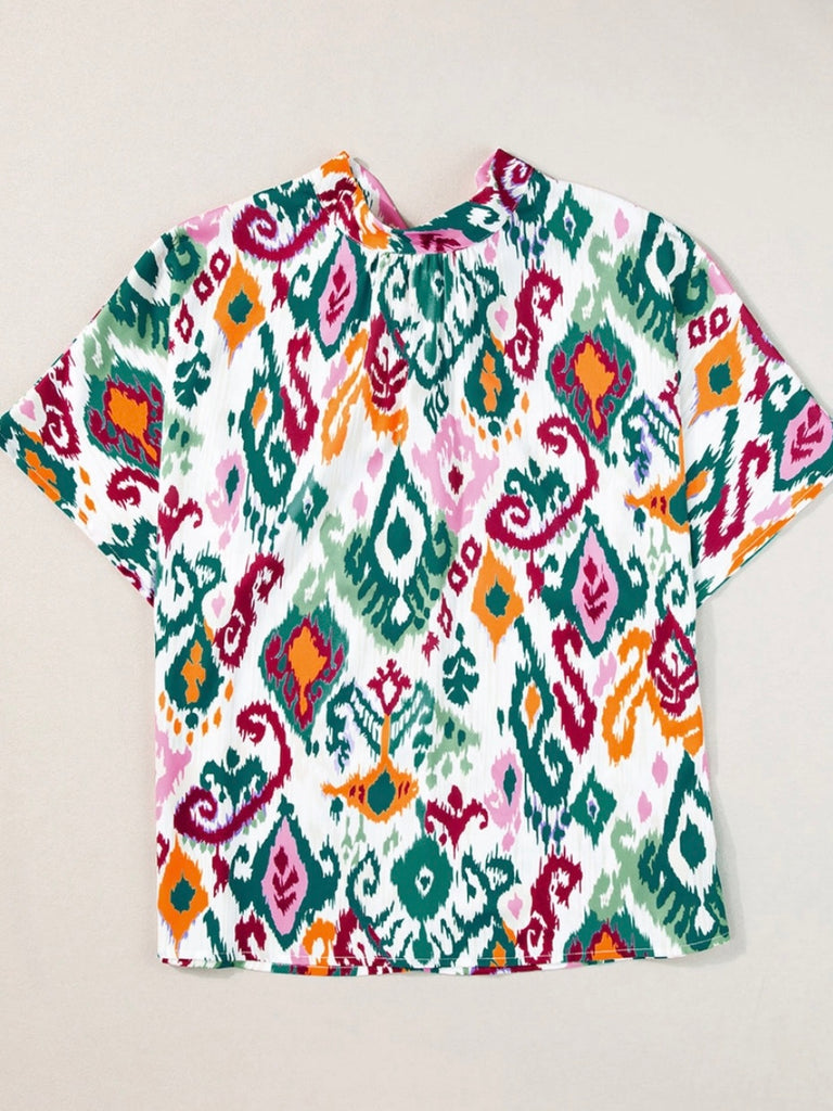 Colourful Western Ikat Print Blouse with High Neck and Bat Sleeve Design.