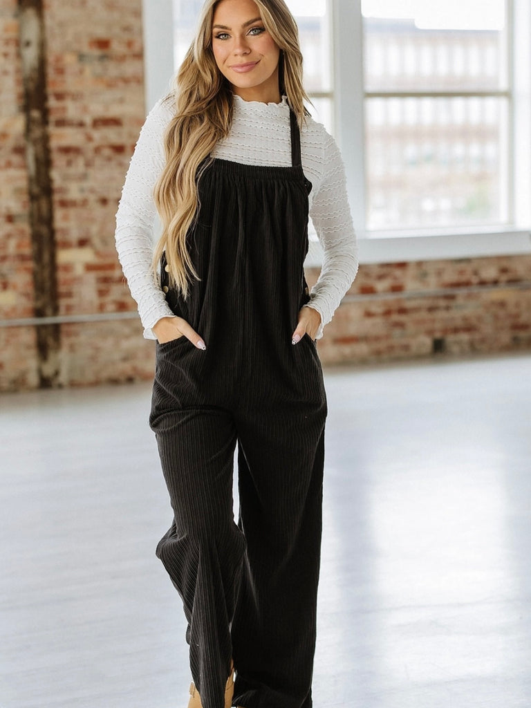 Black loose fit vintage-inspired corduroy Overalls with Multi-pocket design for added functionality.