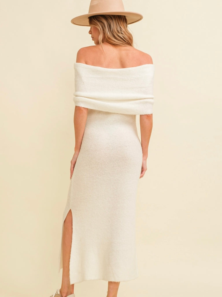 Ivory Creme off-shoulder Midi dress, is made with a 50/50 blend of acrylic and polyamide.