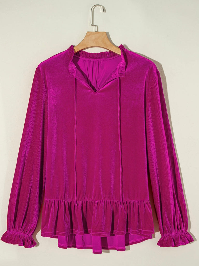  Fuchsia pink velvet Top with ruffled long sleeves and a Drawstring V-Neck neckline.