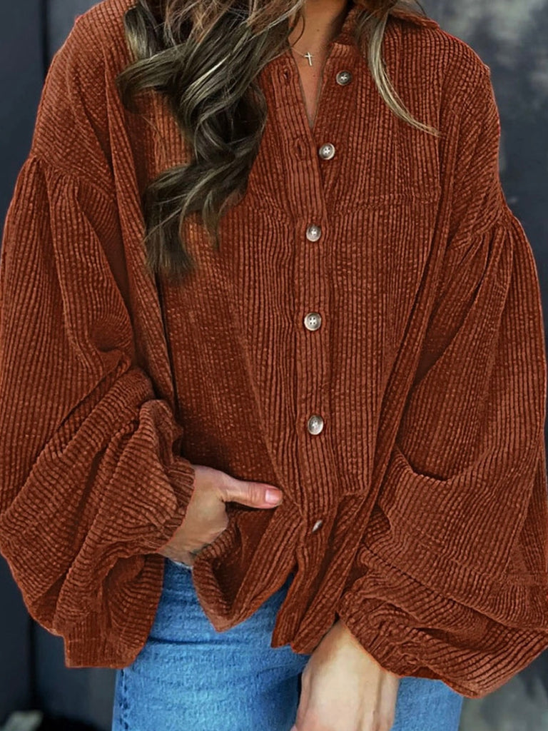 Brown Corduroy Shacket features a trendy oversized fit, with puff sleeves and a pleated back and button front.