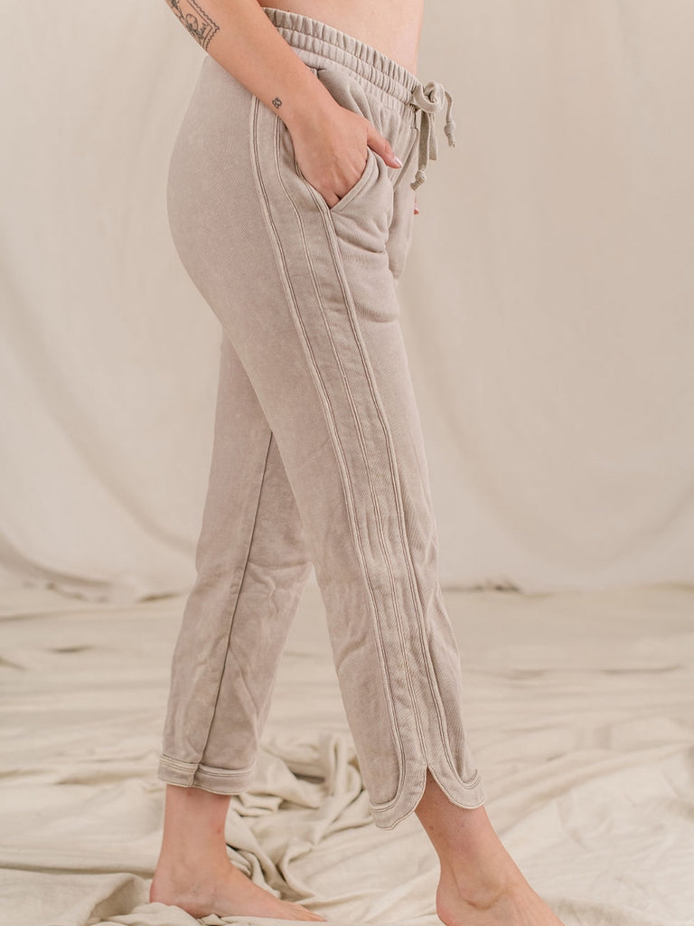 Medium Stretch Stone -Grey elastic-waisted, straight-legged pant with two side pocket and hem slits, and tie waist.