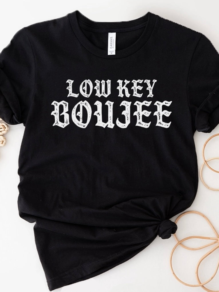 Black t-shirt features a playful white front graphic that says "low key Boujee."