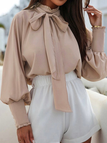 Khaki Brown, loose fit ,Mock neck with Bishop sleeves ,and frilled, buttoned cuffs with  a Self-tie bow for a feminine touch.