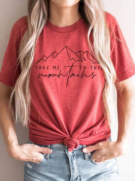  Heather-red colour Tee with a graphic on the front that reads "Take me to the Mountains." 