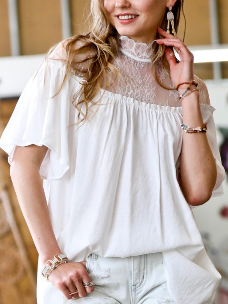 White Boho Lace shoulder detail Blouse with key hole back and shirring line with a loose fit and made from 100% cotton.