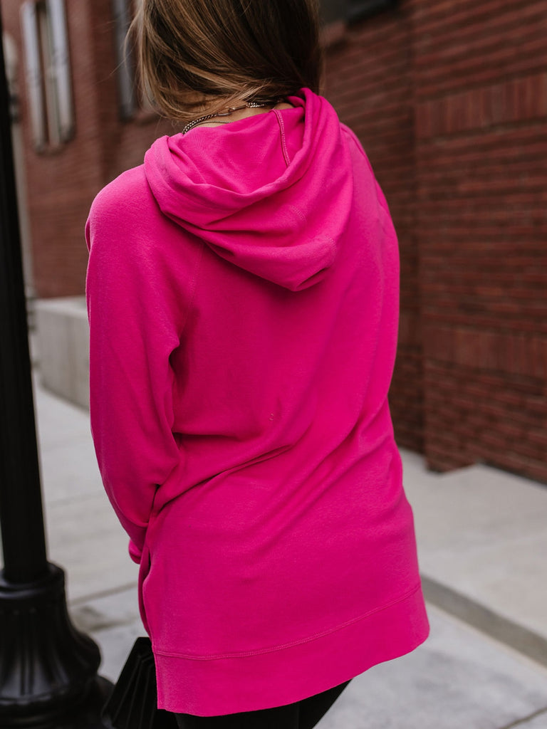 Pink Drawstring Triple Stretch Hoodie with Front Pocket and roomy side slits.