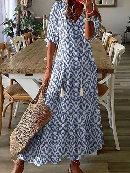 Flowy Blue and White Ikat Maxi-Dress with tie-neckline.