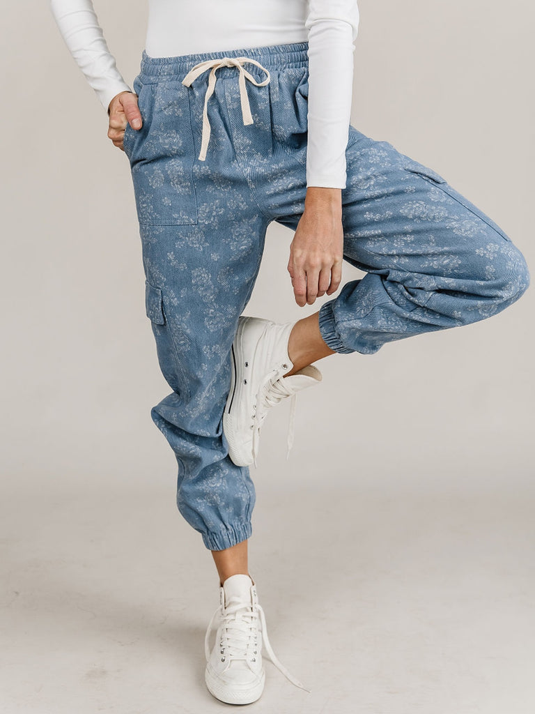 Denim Joggers, features include : a drawstring waist, curved elastic ankle and light-wash denim, with a spring-fresh, white floral print.