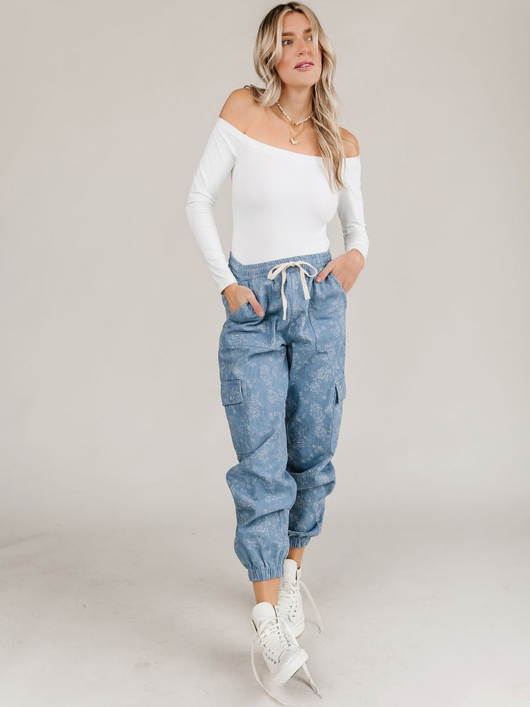 Denim Joggers, features include : a drawstring waist, curved elastic ankle and light-wash denim, with a spring-fresh, white floral print.