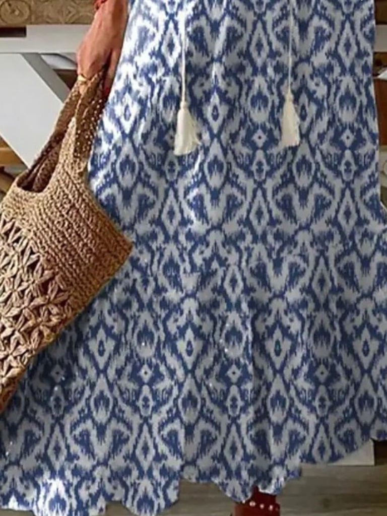 Flowy Blue and White Ikat Maxi-Dress with tie-neckline.