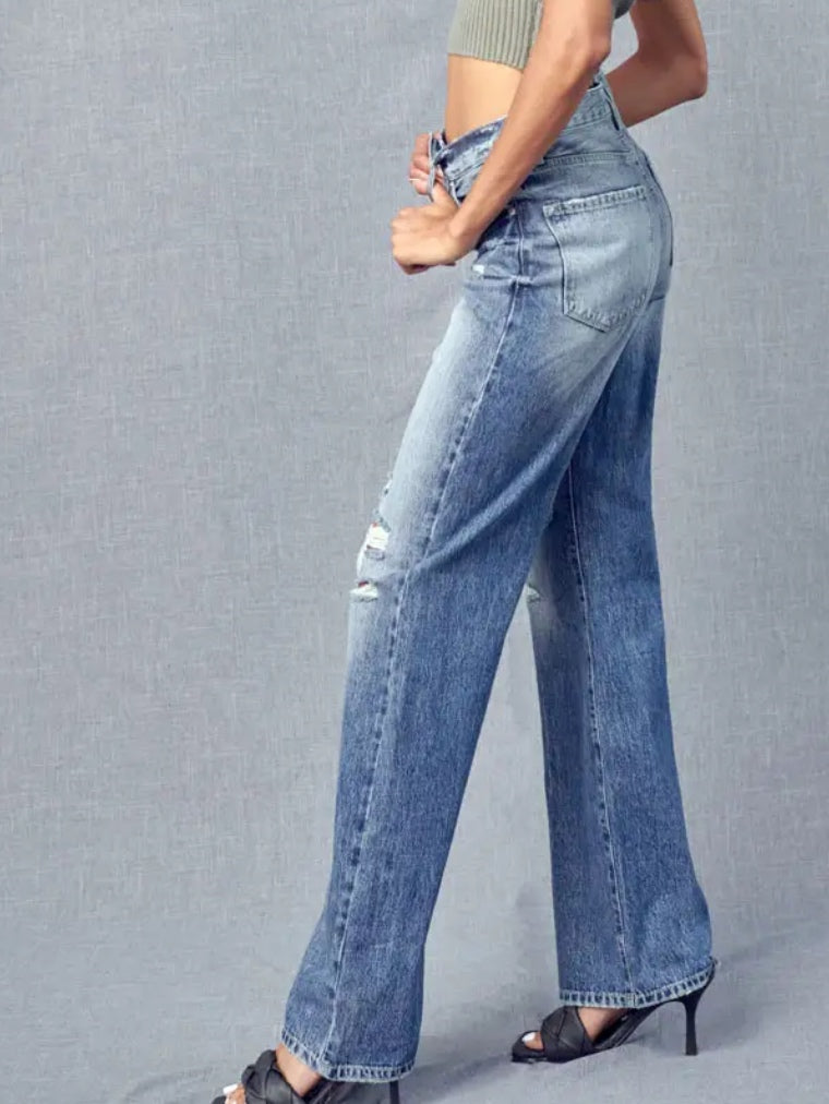 Distressed at knee , with 5 piece button front and Wide Retro Flare Leg Jeans