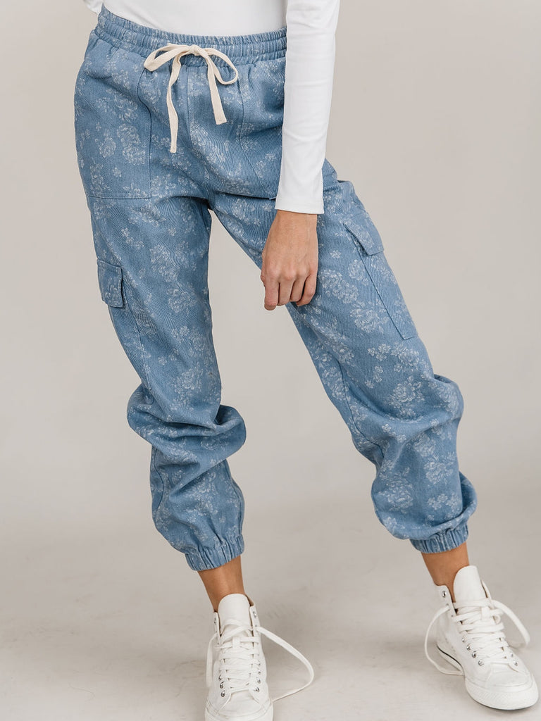 Denim Joggers, features include : a drawstring waist, curved elastic ankle and light-wash denim, with a spring-fresh, white floral print.