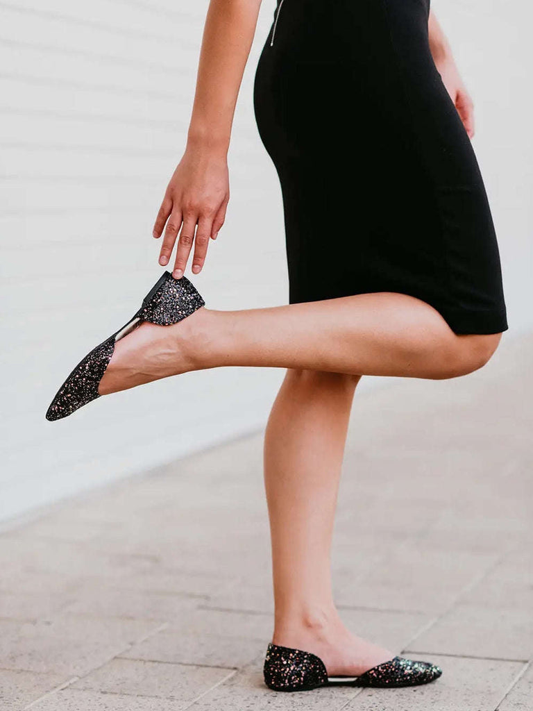 Black sparkle pointed d'orsay flats Every pair comes with a high-heel carrying bag , and comes with a complimentary heel pad to customize your perfect fit.