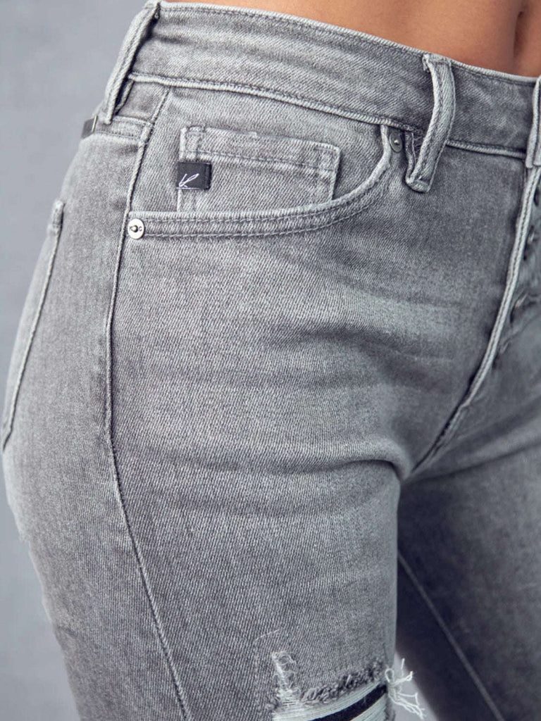 Grey Cropped, straight leg -piece button front closure,  5 pockets denim jeans with tattered details, and a cuffed hem with distress detail.